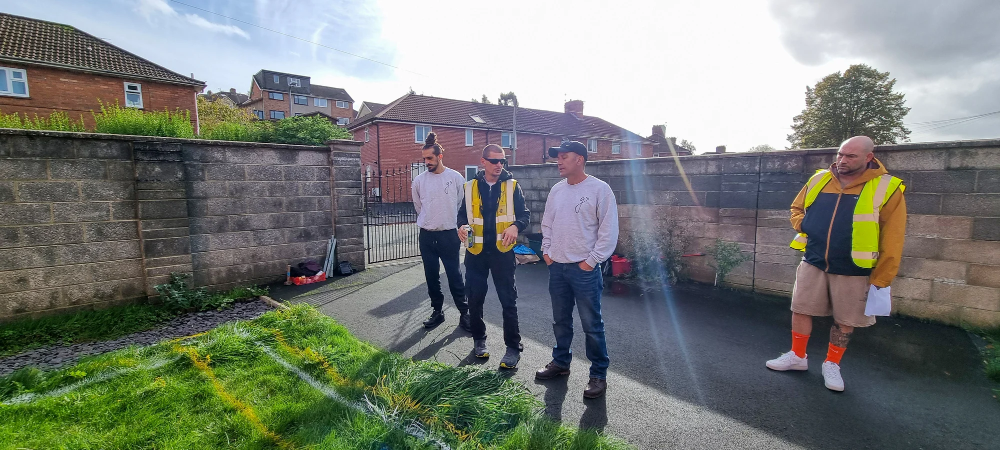 Gate5 team discussing a residential project on site